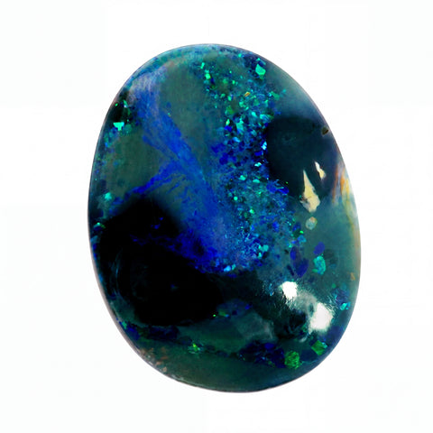 A polished oval cabochon gemstone featuring a marbled pattern of vibrant blue, teal, and deep black, with sparkling inclusions, set against a plain white background.