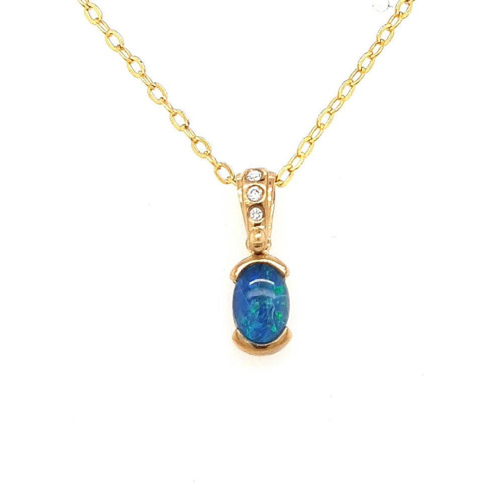 Australian Opal Triplet 7 x5 mm Pendant set in 9 Karat Yellow Gold with 3 x Diamonds Weighing 0.03 Carat