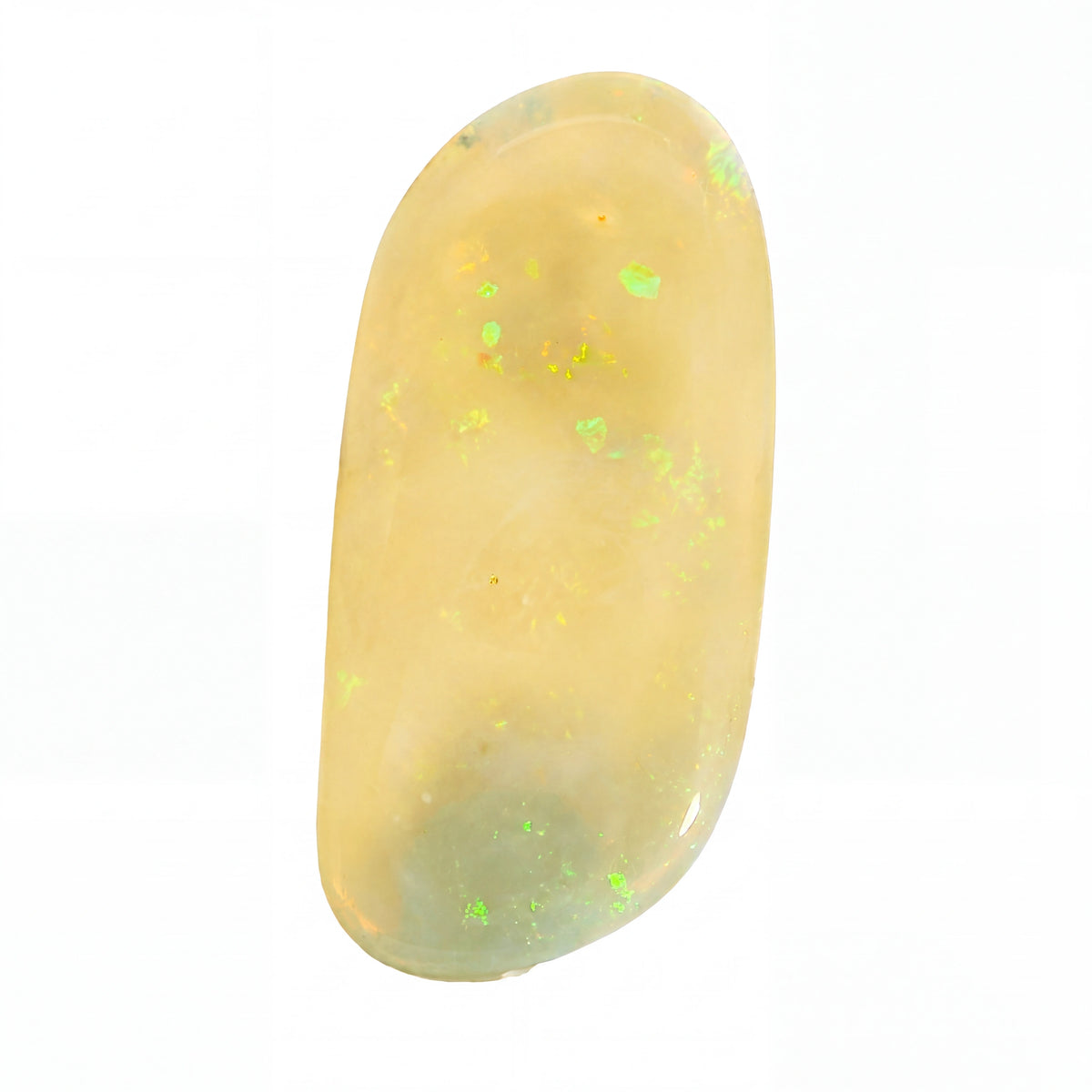 A polished oval cabochon gemstone with a creamy yellow body and scattered iridescent green flashes, shown on a plain white background.