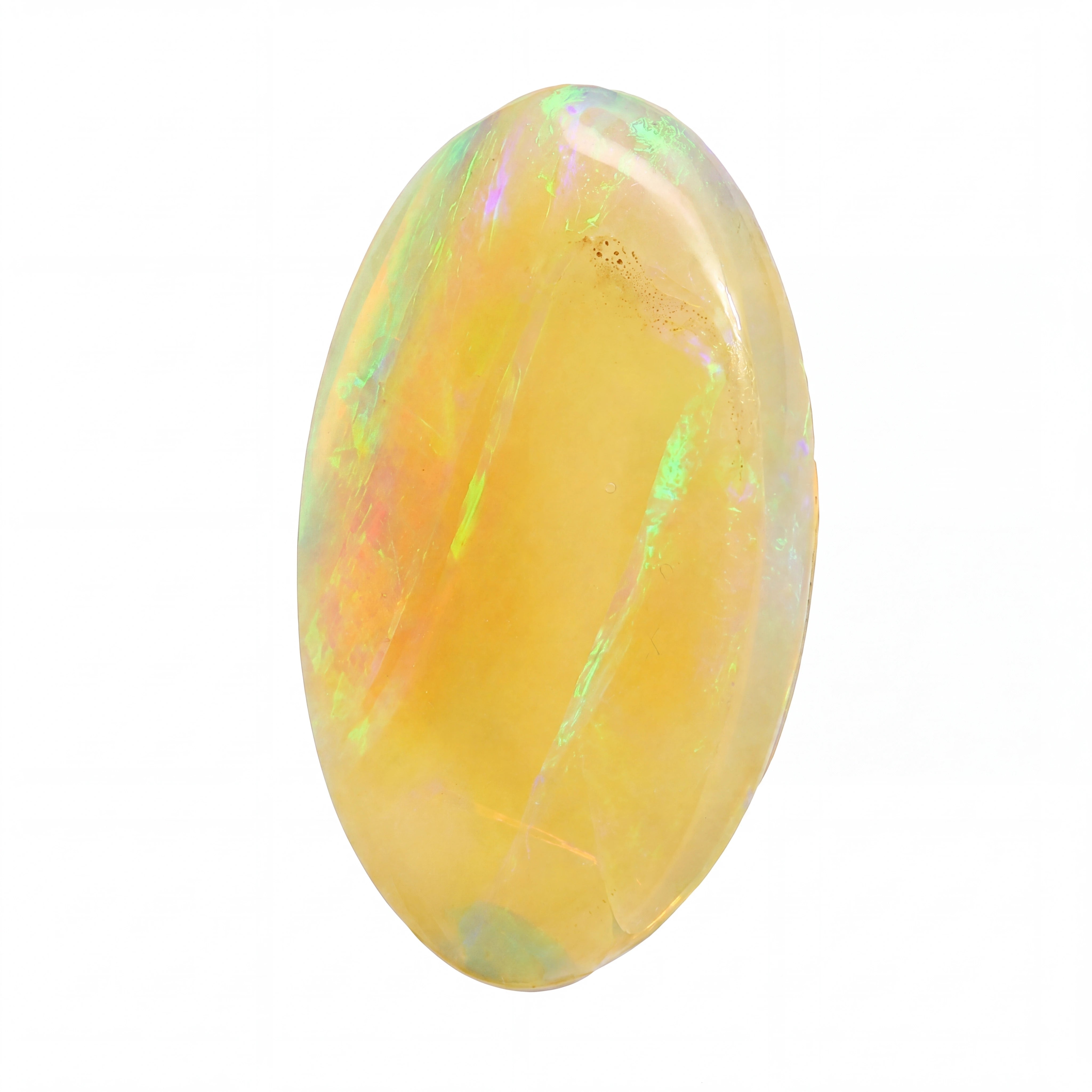 A polished oval cabochon gemstone with a warm yellow-orange body and iridescent flashes of green, blue, and pink, shown on a plain white background.