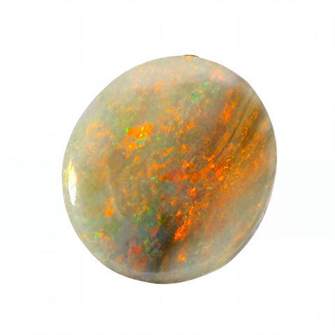 A polished oval cabochon opal gemstone displaying vibrant orange, green, and grey flashes against a white background.