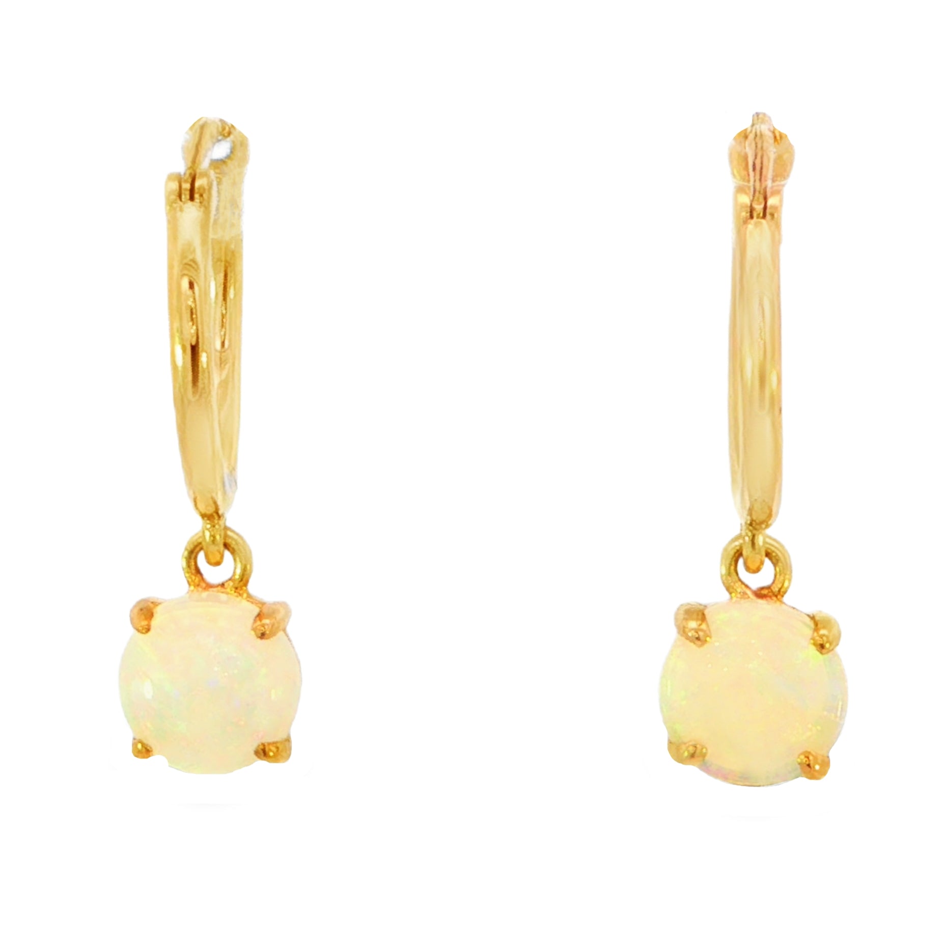 A pair of gold huggie hoop earrings with oval white opal dangles, shown against a plain white background.