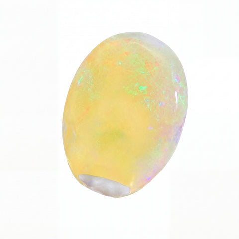 A polished oval cabochon gemstone with a soft yellow body and iridescent flashes of green, blue, and pink, shown on a plain white background.