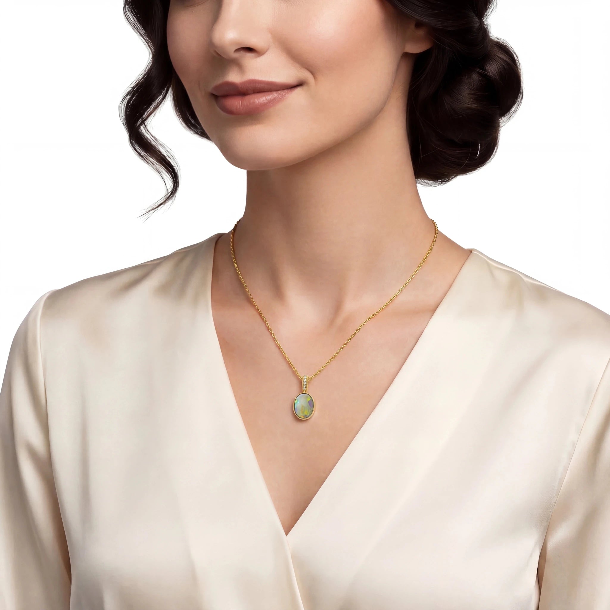 Woman wearing a gold necklace with a green opal pendant on a white background