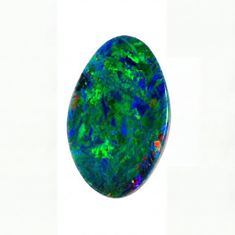 A polished oval cabochon opal gemstone displaying vibrant iridescent colours of green, blue, and orange on a plain white background.