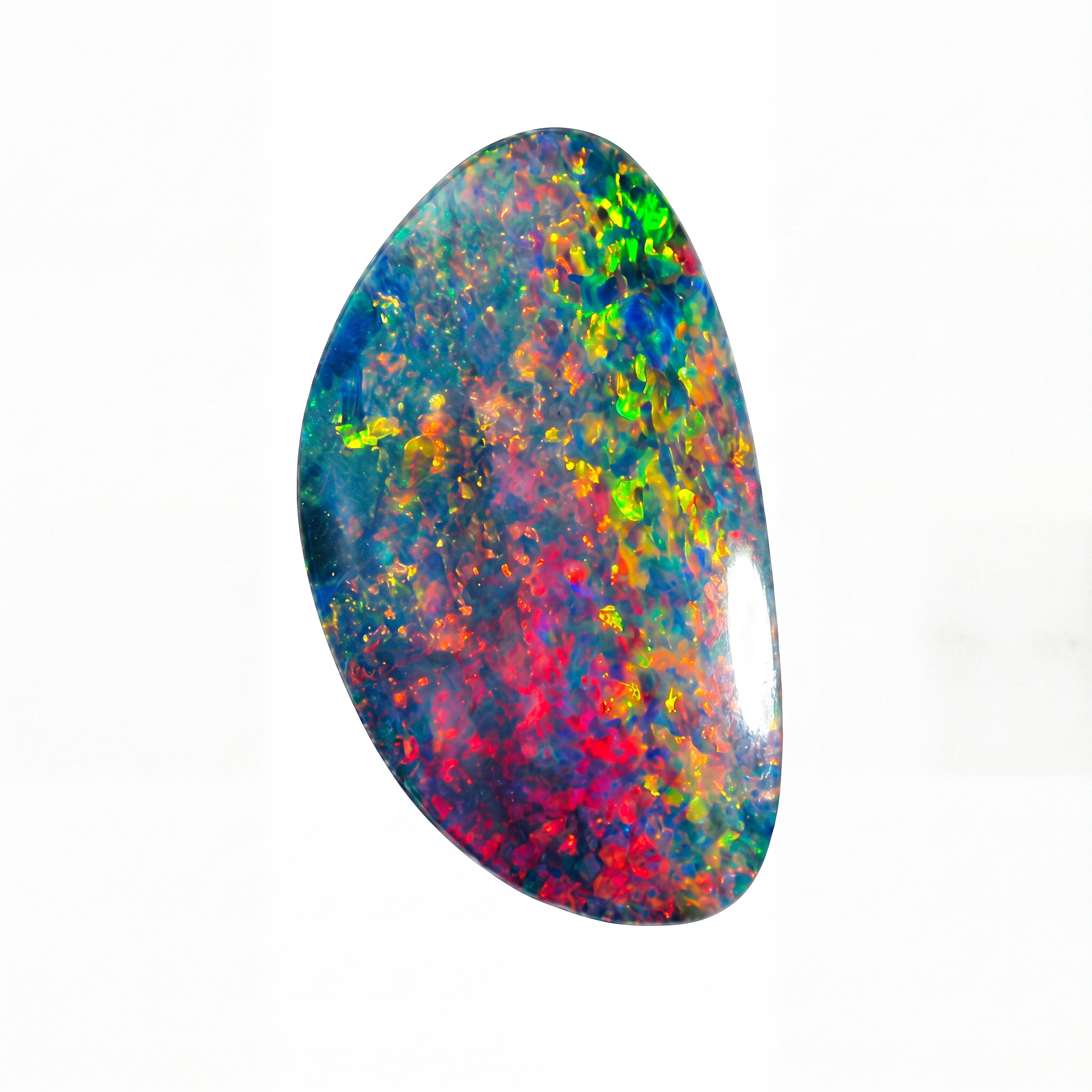 A polished teardrop-shaped iridescent opal gemstone displaying a vibrant mix of blue, green, yellow, orange, and red colours on a plain white background.