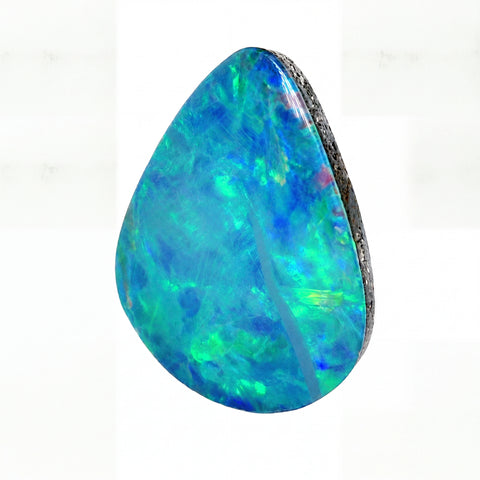 A teardrop-shaped loose opal gemstone with vibrant blue, green, and turquoise iridescent play-of-colour, set in a dark rough metallic bezel, shown on a plain white background.