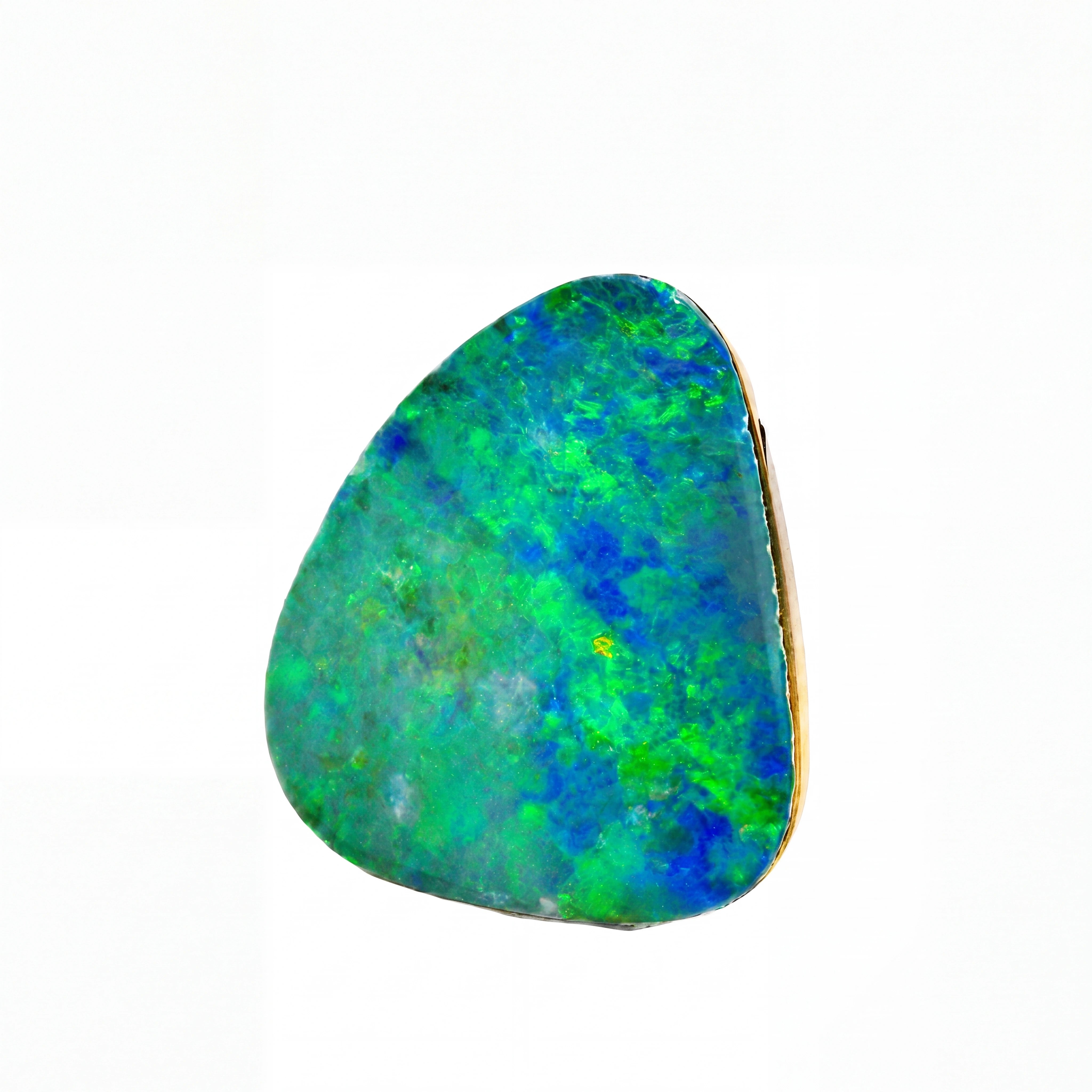A triangular opal stone with vibrant green and blue play-of-colour, set in a gold bezel setting against a plain white background.