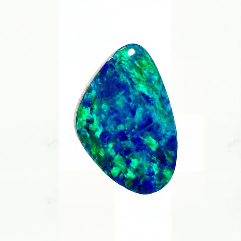 A teardrop-shaped natural opal gemstone pendant with vibrant blue and green iridescent play-of-colour, shown on a clean white background.
