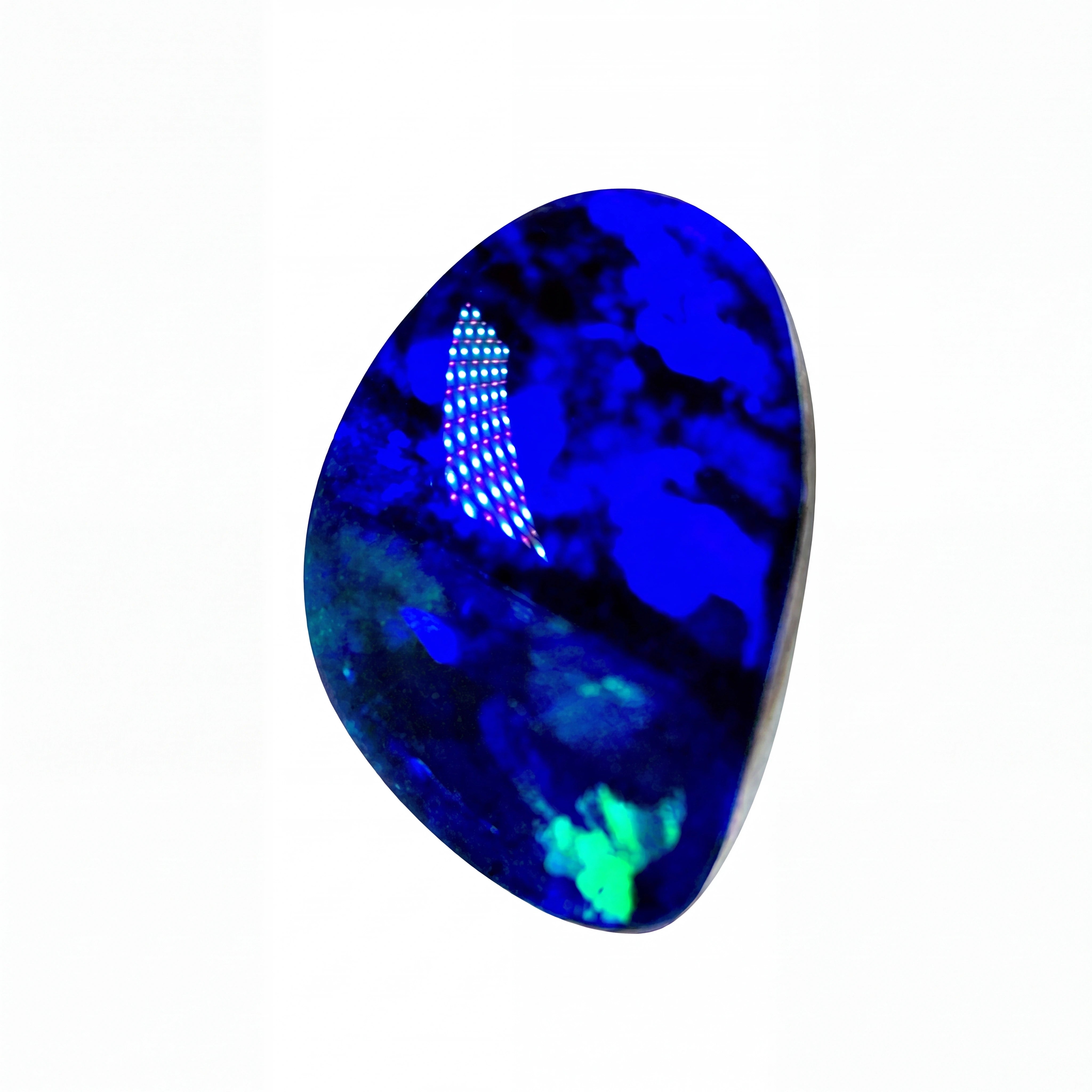 A polished, teardrop-shaped blue opal gemstone with vibrant blue, black, and green flashes, displayed on a clean white background.