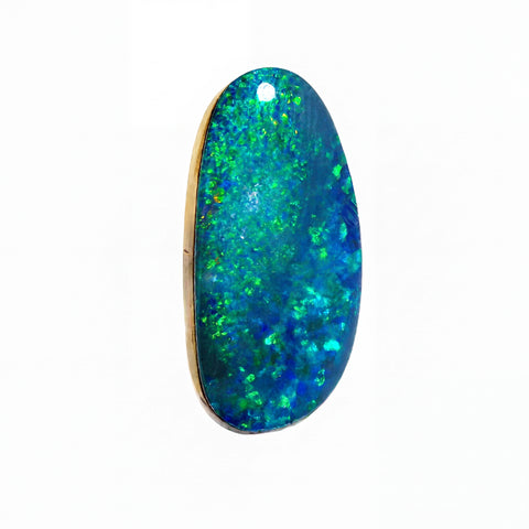 A polished teardrop-shaped cabochon opal gemstone displaying a dark blue-grey base with vibrant green, blue, and hints of orange flashes, set against a plain white background.