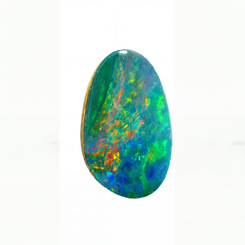 A polished oval opal gemstone displaying a vibrant play-of-colour with blue, green, orange, and purple hues, isolated on a solid white background.