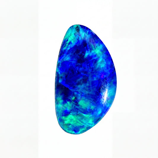 A polished teardrop-shaped cabochon gemstone featuring vibrant blue and green opalescent play-of-colour, displayed on a clean white background.