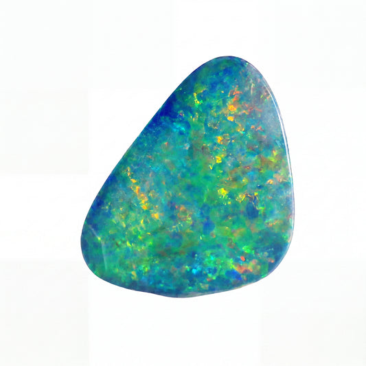A polished irregular-shaped opal gemstone displaying vibrant iridescent colours including green, blue, orange, and yellow against a solid white background.