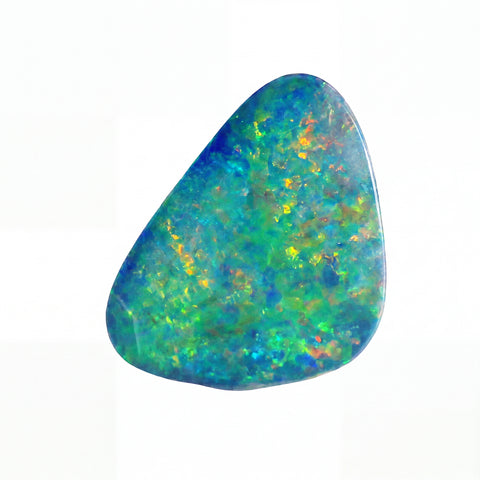 A polished irregular-shaped opal gemstone displaying vibrant iridescent colours including green, blue, orange, and yellow against a solid white background.
