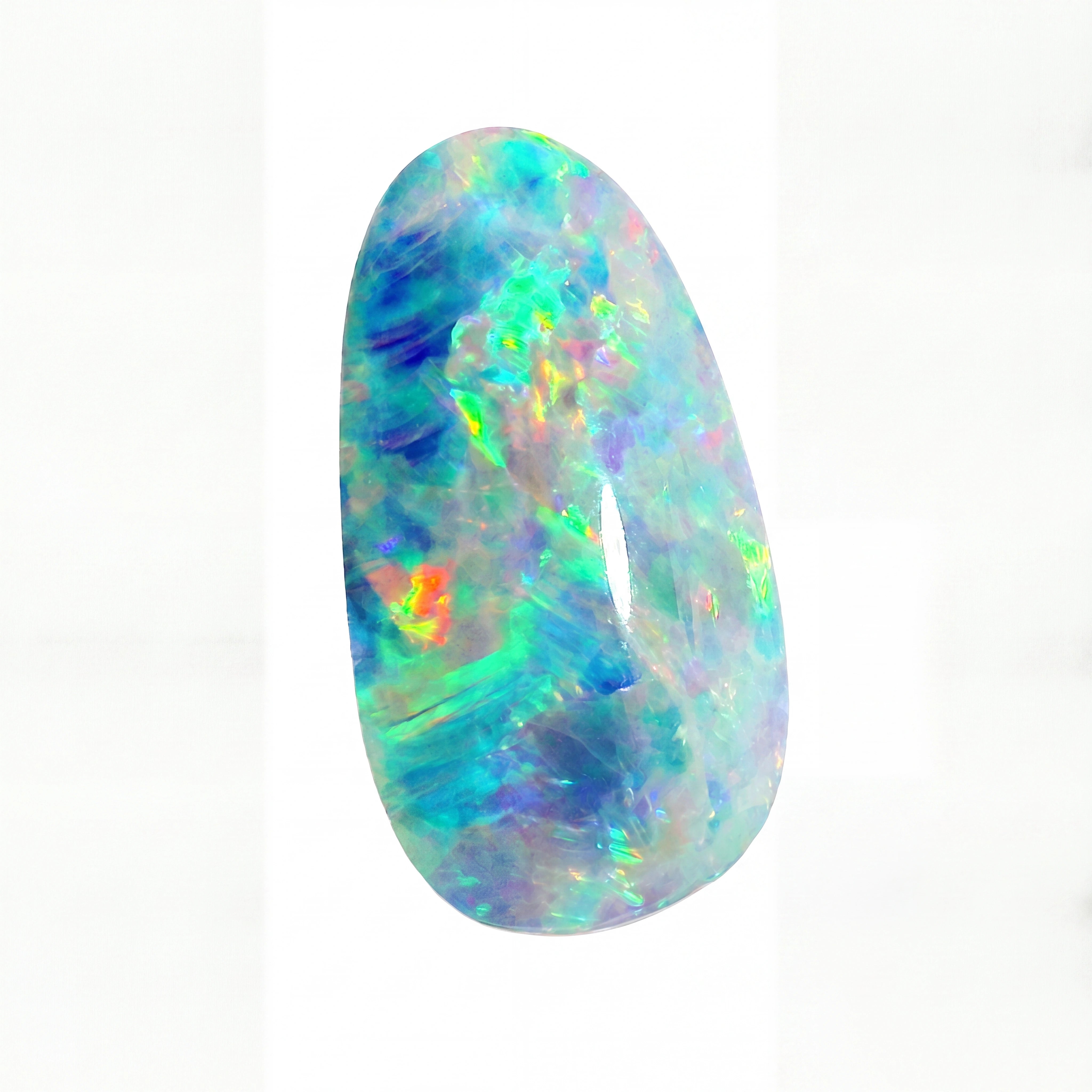 A polished teardrop-shaped opal gemstone displaying vibrant iridescent colours including blue, green, purple, and orange, set against a plain white background.