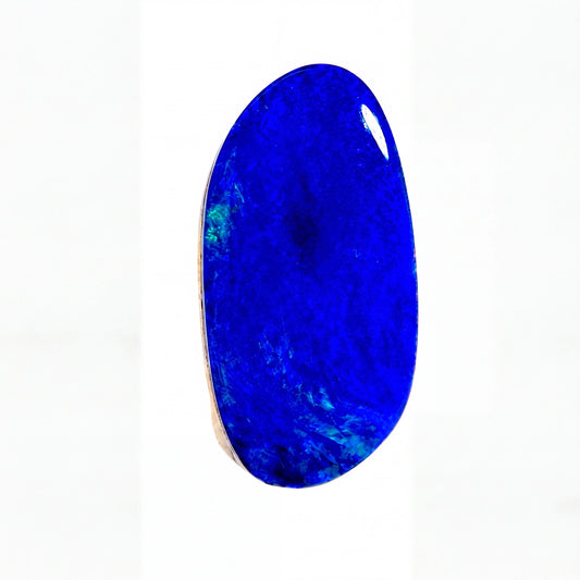 A polished, oval-shaped blue gemstone with natural marbled patterns, isolated on a solid white background.