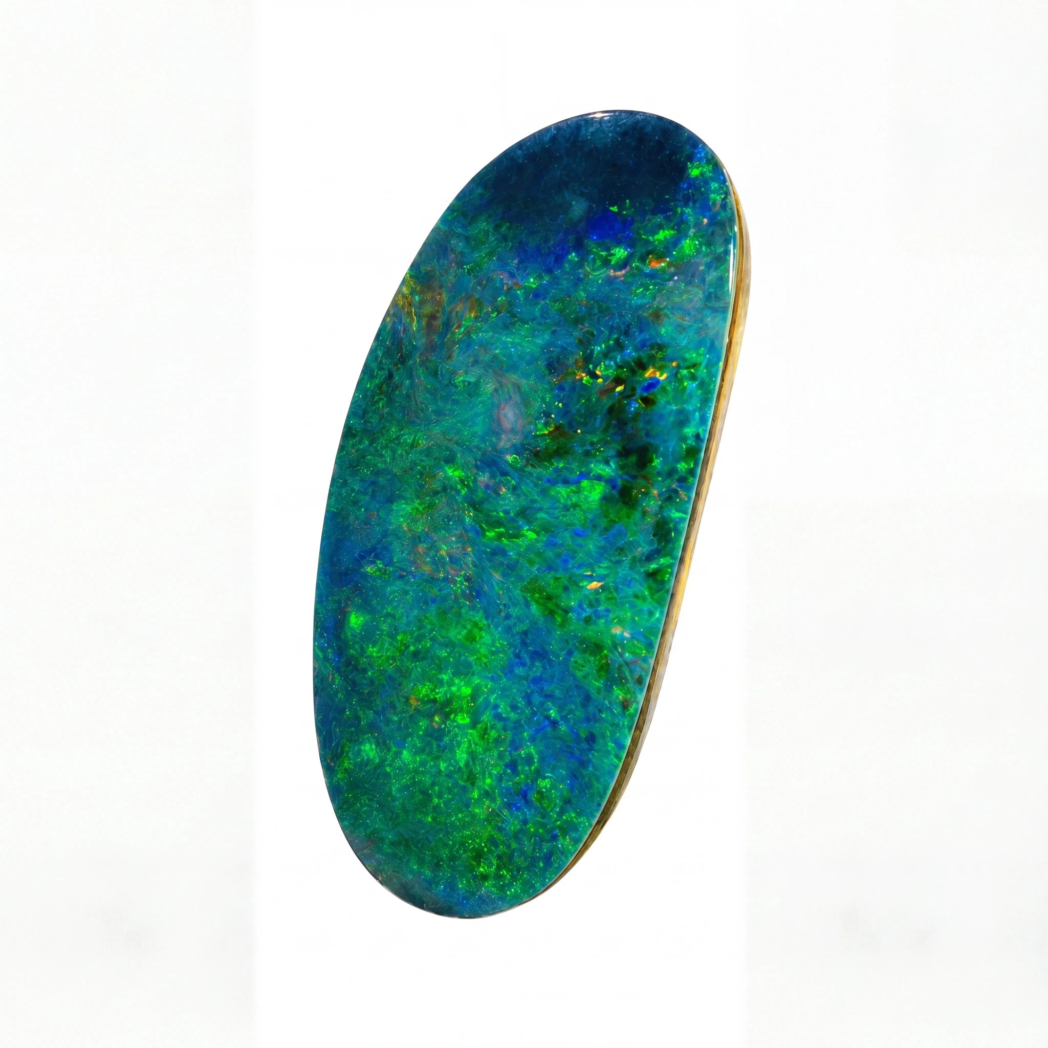 An oval-shaped natural opal gemstone with vibrant blue and green iridescent play-of-colour, mounted on a polished gold-toned bezel, set against a plain white background.