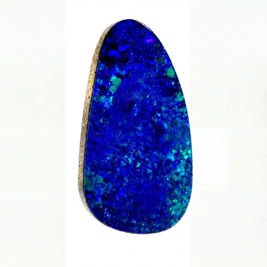 A teardrop-shaped blue opal gemstone with vibrant blue and green flashes, isolated on a solid white background.