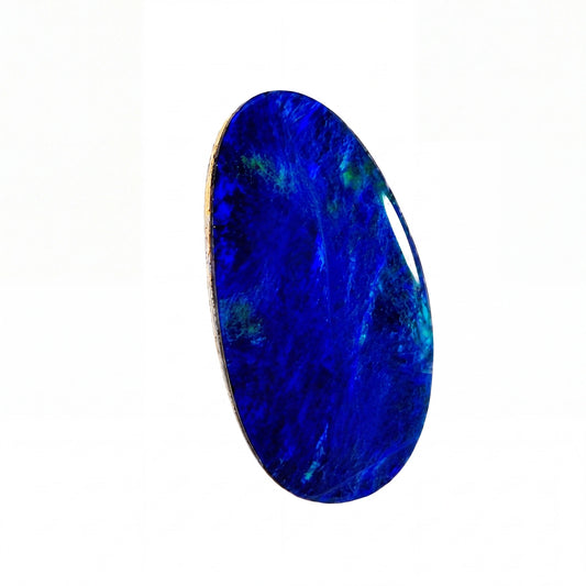 A polished oval cabochon gemstone with a deep blue and violet marbled pattern, set against a plain white background.