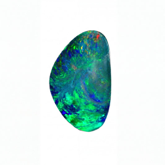 A polished irregular-shaped opal gemstone displaying vibrant iridescent colours including green, blue, and hints of orange and red, set against a plain white background.