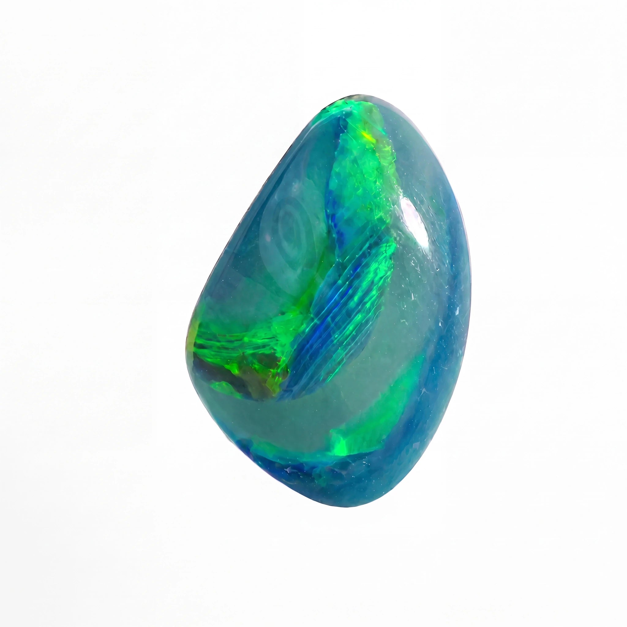 A polished cabochon opal gemstone displaying vibrant iridescent colors including blue, green, yellow, and orange, set against a solid black background.