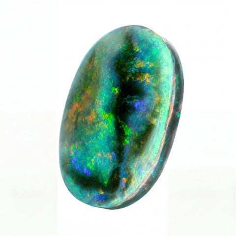 A polished oval cabochon opal gemstone displaying vibrant iridescent flashes of green, blue, orange, and purple against a clean white background.