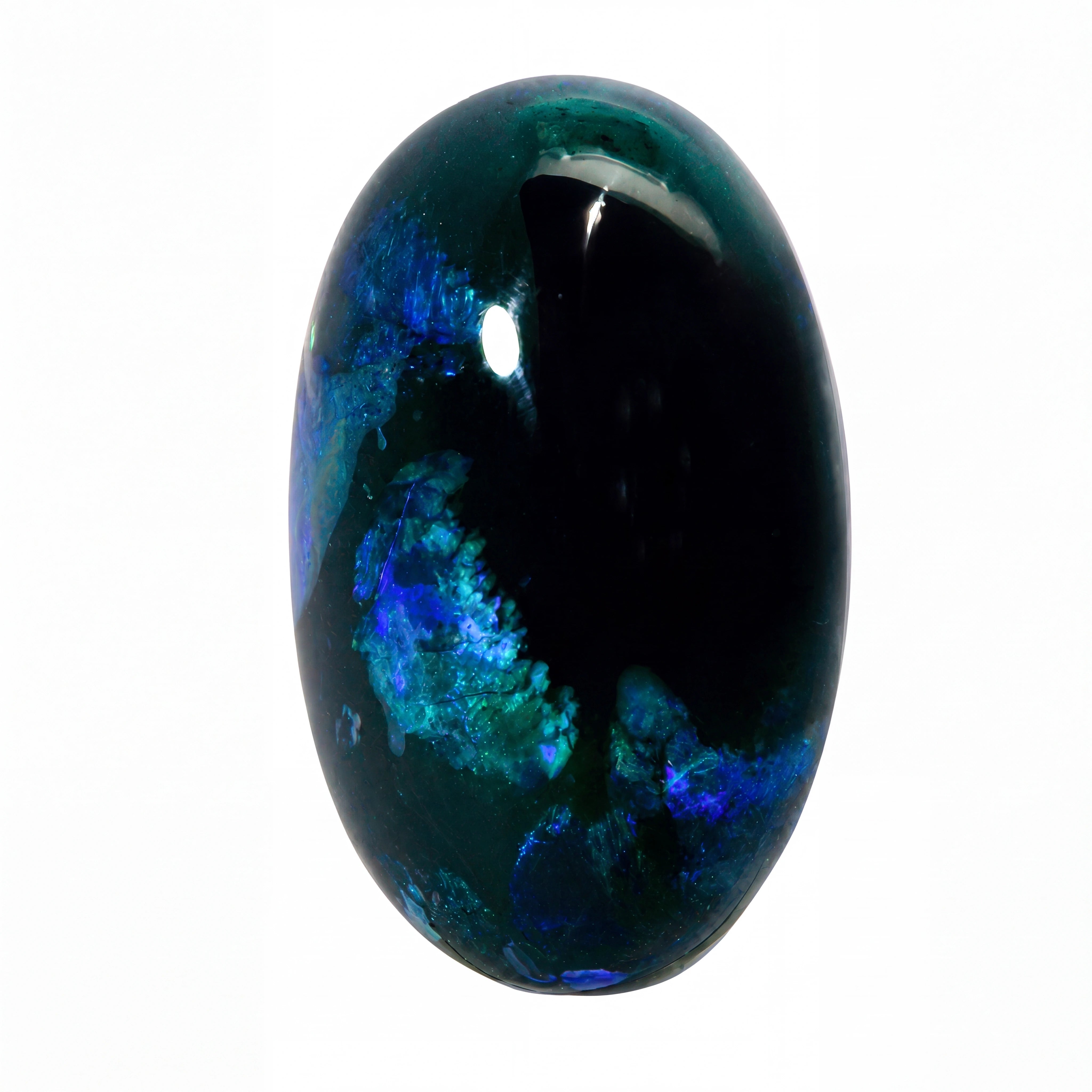 A polished oval opal gemstone featuring a deep black body with vibrant blue, teal, and green iridescent patterns, set against a plain white background.