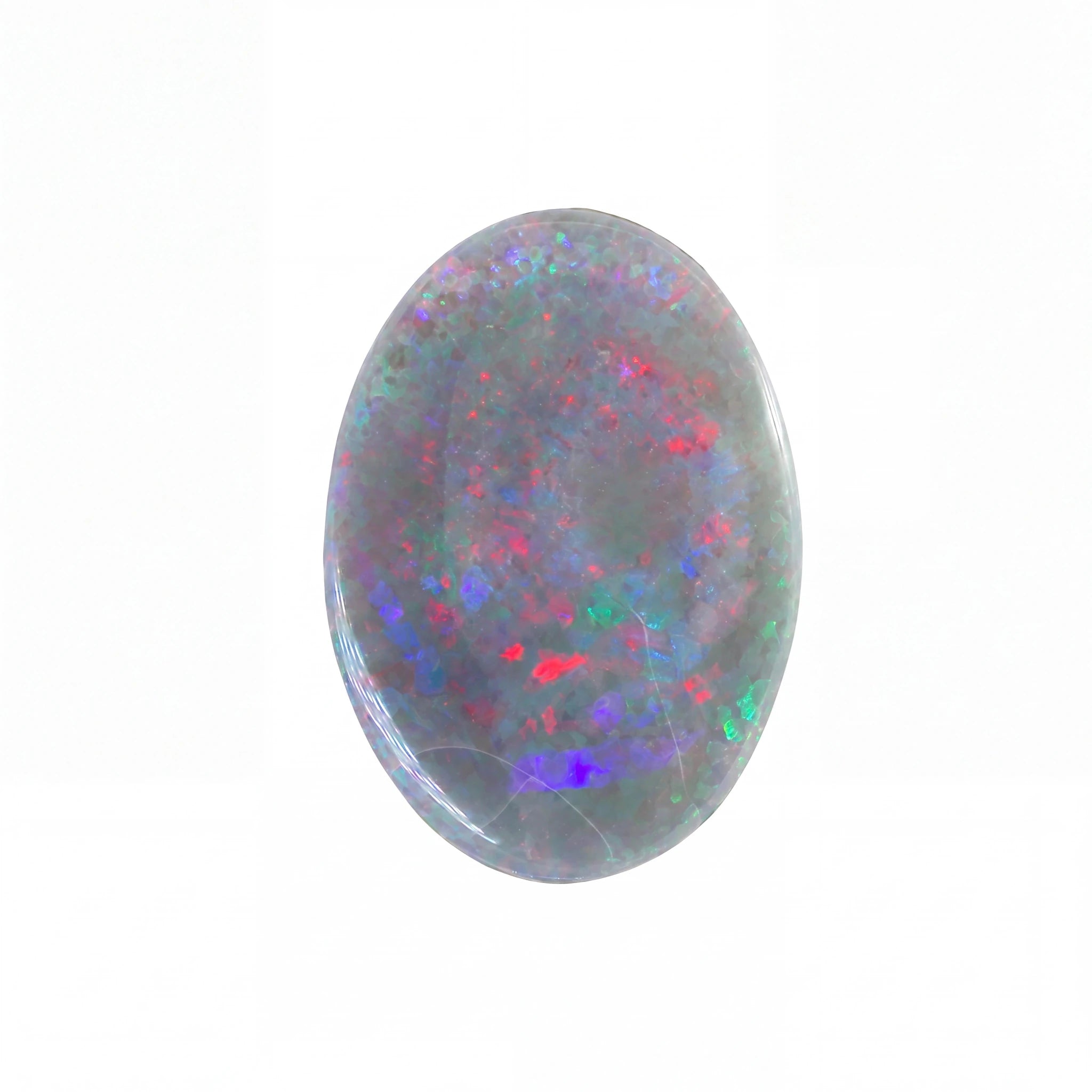 A polished oval cabochon opal gemstone displaying a play-of-colour pattern with red, blue, green, and purple flashes on a grey base, set against a plain white background.