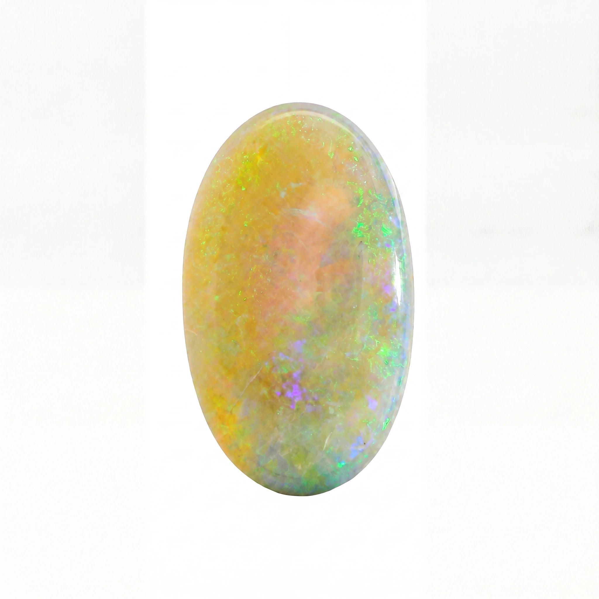 An oval cabochon gemstone showing a play-of-colour opal pattern with vibrant flashes of green, blue, purple, and yellow over a warm peach and cream base, set against a plain white background.