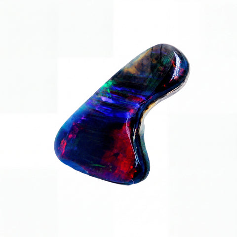 A polished natural opal stone with vibrant iridescent colours including blue, red, green, and purple, set against a plain white background.