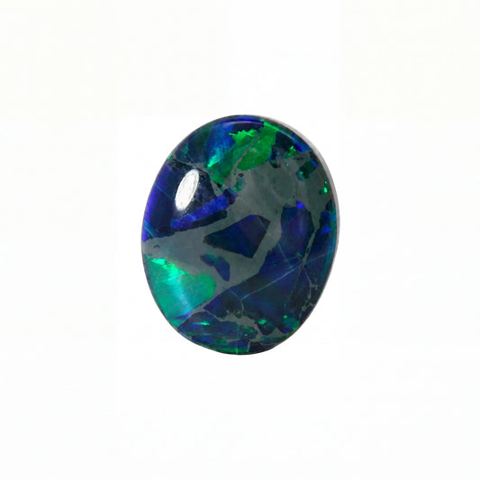 A polished oval cabochon gemstone featuring a vibrant play-of-colour pattern with deep blue, emerald green, and black tones, set against a plain white background.