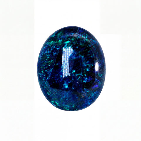 A polished oval cabochon gemstone featuring a deep blue and teal iridescent pattern, set against a plain white background.