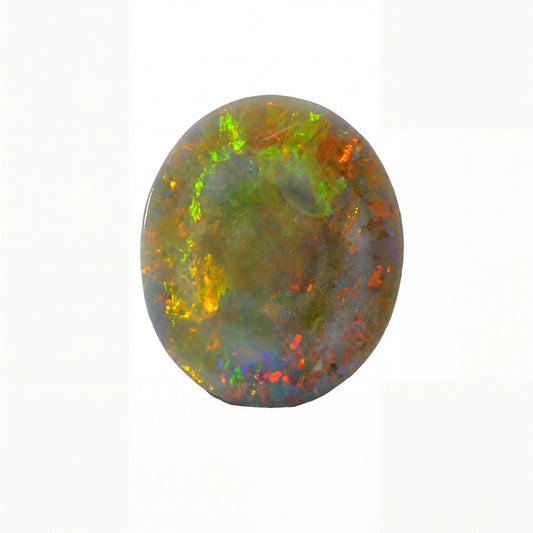 An oval cabochon gemstone showing a vibrant play-of-colour with green, orange, yellow, and blue flashes on a white background.