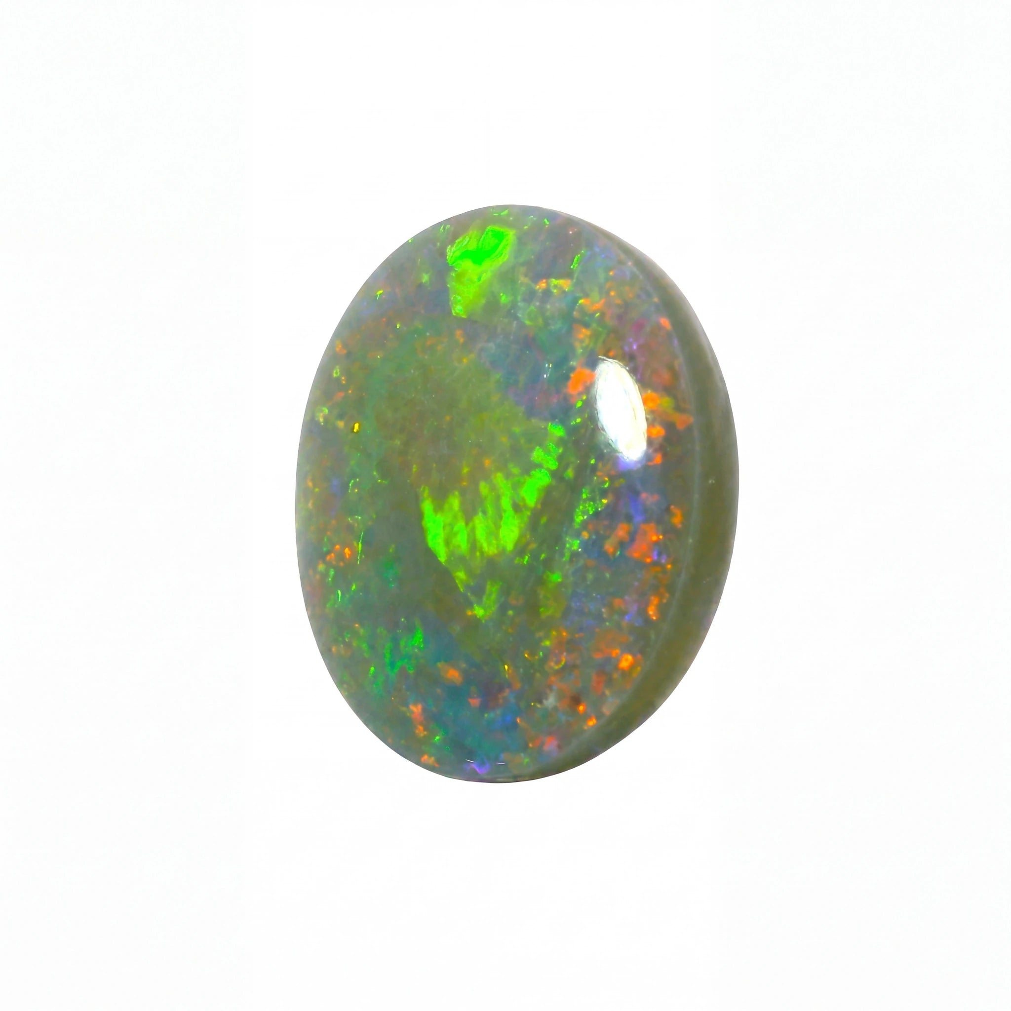 A polished oval cabochon opal gemstone displaying vibrant flashes of green, orange, and blue iridescence on a white background.