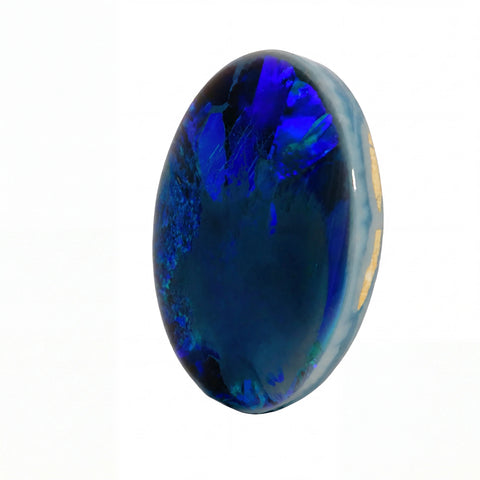 A polished oval cabochon gemstone showing a rich blue iridescent play-of-colour, set against a plain white background.