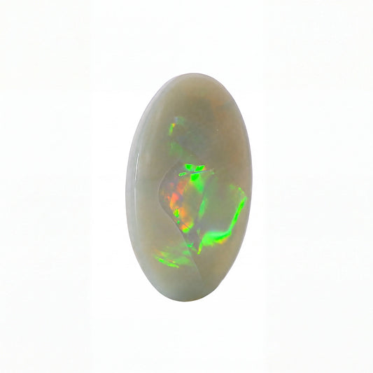 A polished oval cabochon opal gemstone displaying vibrant flashes of green, orange, and red iridescence against a pale greyish-white base, set against a plain white background.