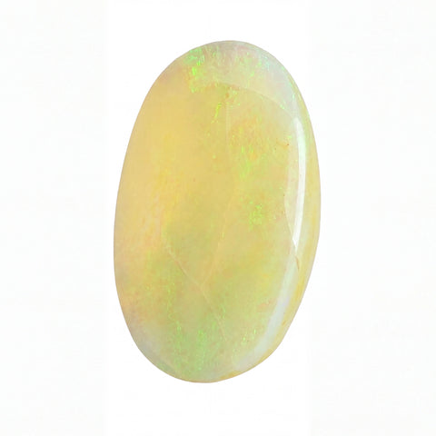 A polished oval cabochon gemstone with a creamy yellow body and iridescent green flashes, shown on a plain white background.