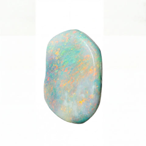A polished, irregularly shaped opal gemstone displaying a play-of-colour with iridescent flashes of orange, yellow, green, and blue on a white background.