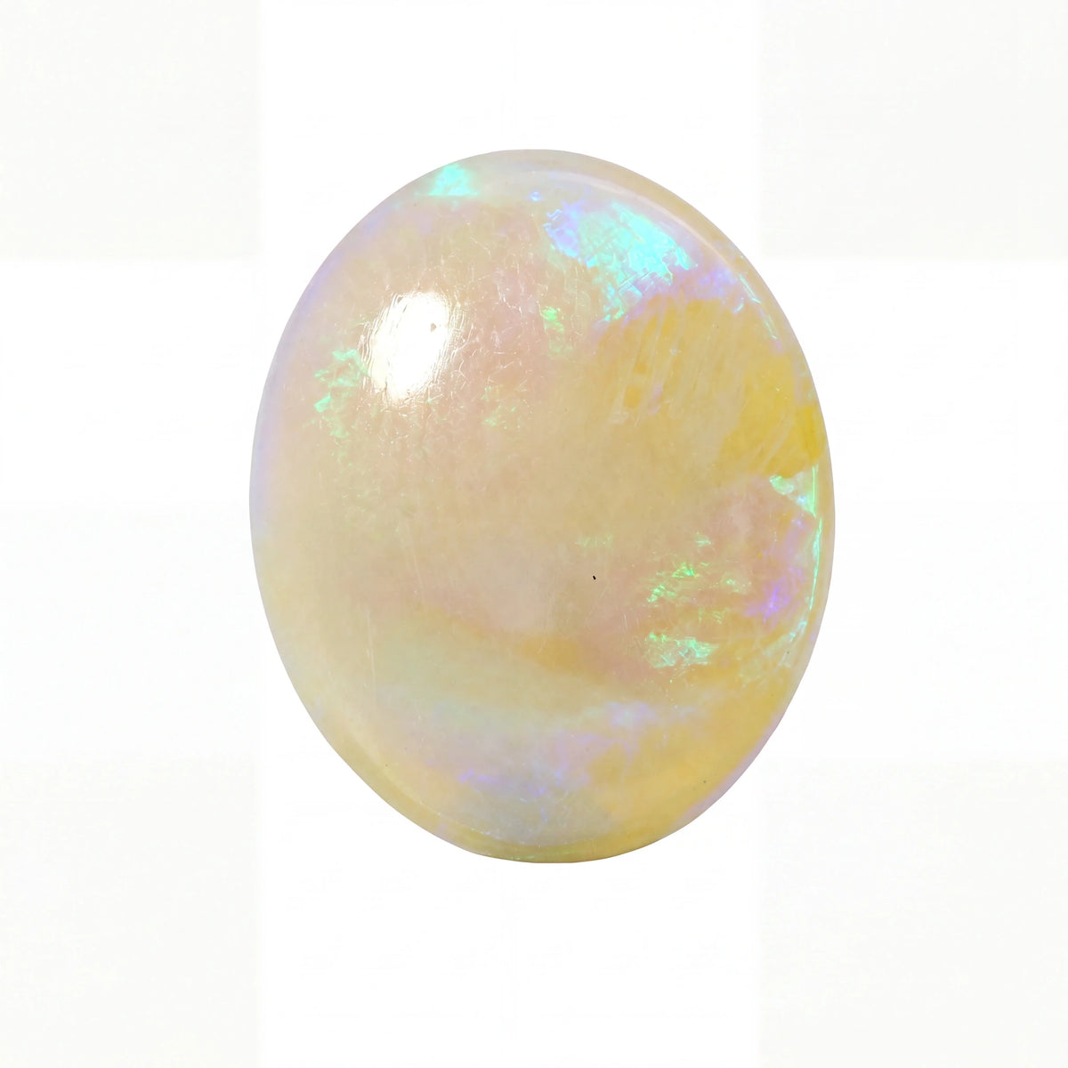 A polished oval cabochon gemstone with a milky white base and iridescent flashes of pastel blue, green, and yellow, shown on a plain white background.