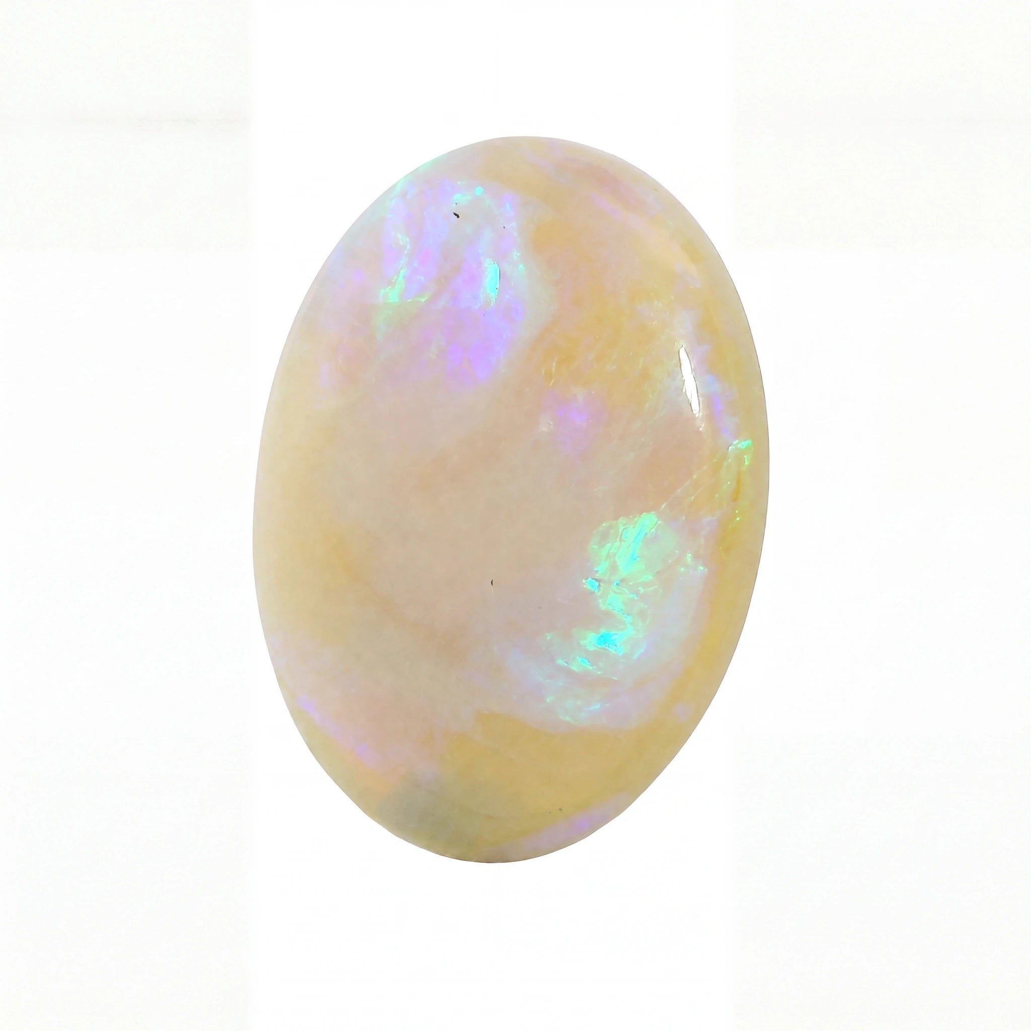 A polished oval cabochon opal gemstone displaying a soft cream base with iridescent flashes of purple, blue, and green, set against a plain white background.