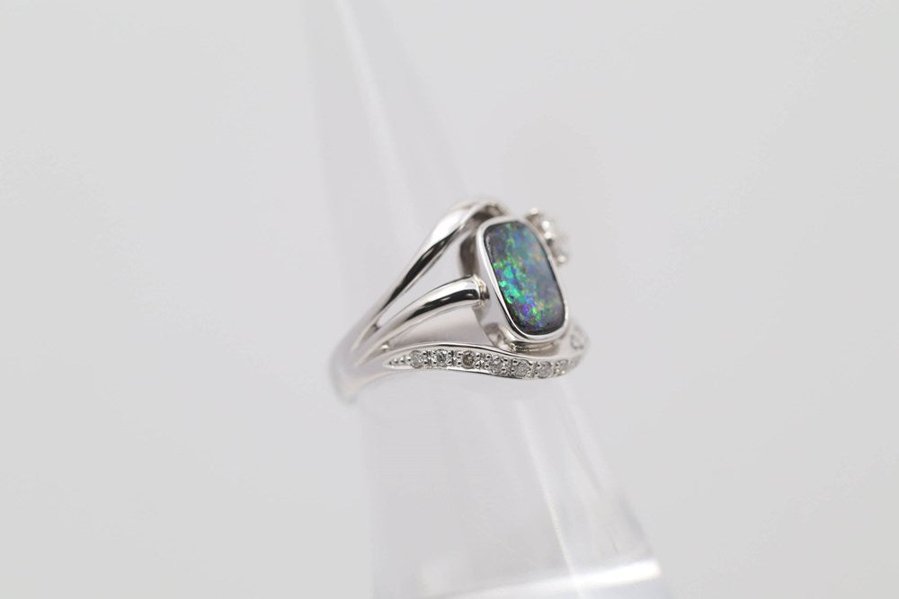Boulder Opal Ring 9.00 x 5.50 mm 1.64 carats set in18k Platinum PT900 with 16x G-H/Vvs-Si1 Diamonds TW 0.280 Carats