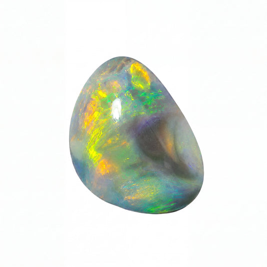 A polished teardrop-shaped opal gemstone displaying vibrant iridescent colours including yellow, green, blue, and purple on a solid white background.