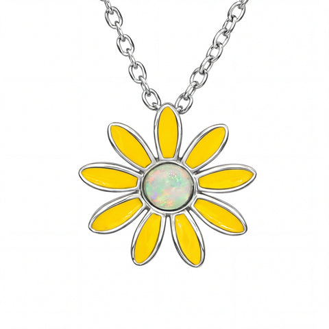Yellow flower-shaped pendant on a silver chain against a white background