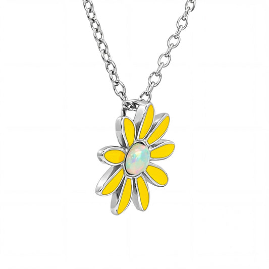 Yellow flower-shaped pendant with opal center on a silver chain against a white background