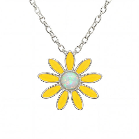 Yellow flower-shaped pendant with a central opal stone on a silver chain against a white background