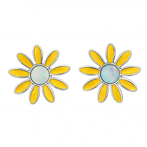 Yellow flower-shaped earrings with a central circular design on a white background