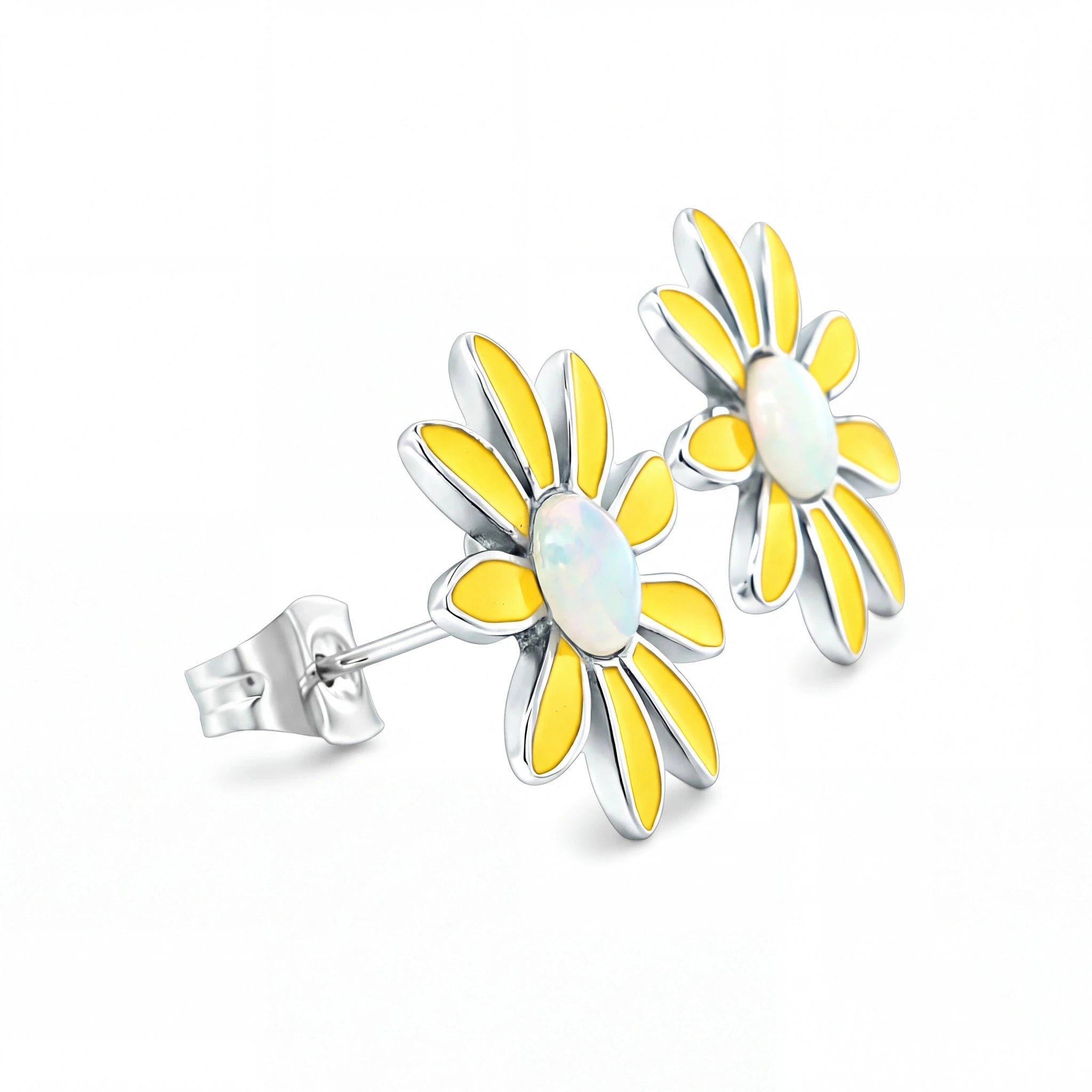 Sunflower-shaped earrings with yellow petals and a white center on a white background