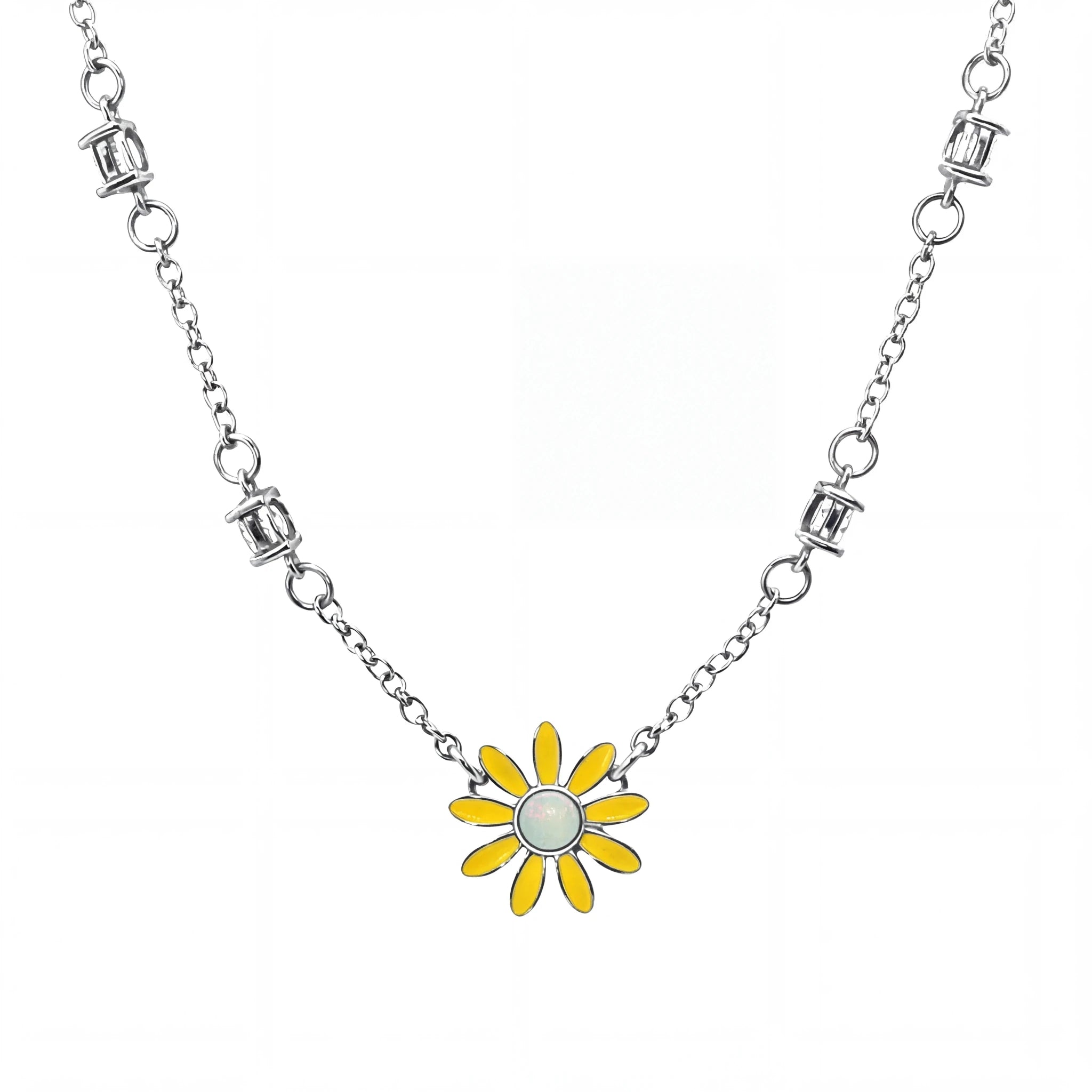 Silver necklace with a yellow flower pendant on a white background