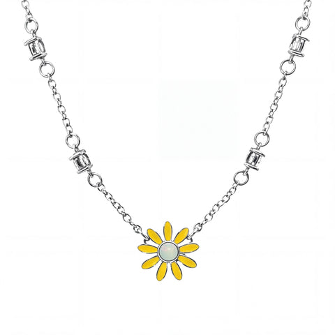 Silver necklace with a yellow flower pendant on a white background